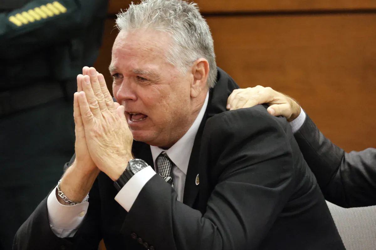 Former Marjory Stoneman Douglas High School School Resource Officer Scot Peterson reacts as he is found not guilty on all charges at the Broward County Courthouse in Fort Lauderdale, Fla., on June 29, 2023. (Amy Beth Bennett/South Florida Sun-Sentinel via AP, Pool)