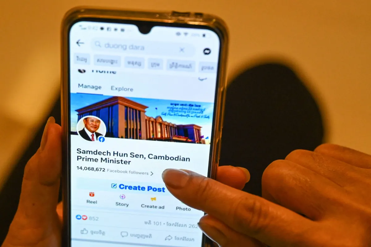 This photo illustration shows a post on Facebook by Cambodian government official Duong Dara, which includes an image of the official Facebook page of Cambodia's Prime Minister Hun Sen before he deleted his account, in Phnom Penh on June 30, 2023. Prime Minister Hun Sen said on June 30 he could block access to Facebook in Cambodia, after the company said it would remove a video in which he threatened to beat up political opponents. (Photo by TANG CHHIN Sothy / AFP) (Photo by TANG CHHIN SOTHY/AFP via Getty Images)