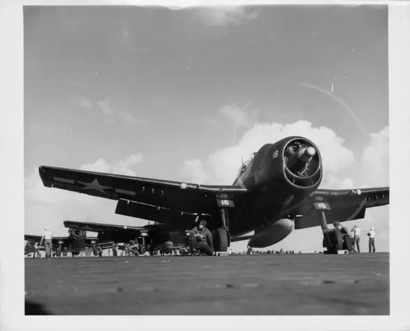 U.S. Chockmen removing the chocks from the wheels of Navy Grumman Hellcats as they prepare to take off, during the strike at Manila Bay during World War II, Philippines, 1945. (U.S. Navy/Getty Images)