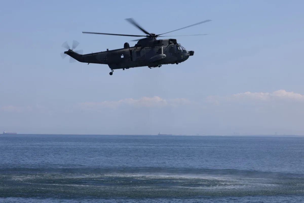  A Sea King helicopter flies over the Baltic Sea near Rostock, Germany, on June 05, 2023. (Sean Gallup/Getty Images)