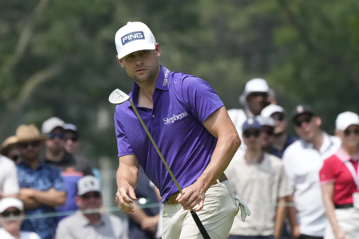 Taylor Moore eyes his putt on the ninth green during the second round of the Rocket Mortgage Classic golf tournament at Detroit Country Club in Detroit on June 30, 2023. (Carlos Osorio/AP Photo)