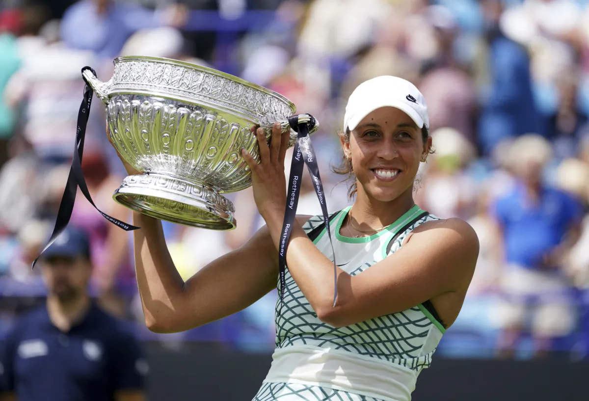 Madison Keys of the United States with the winner's trophy as she celebrates winning the Women's singles final match against Russia's Daria Kasatkina on day eight of the Rothesay International Eastbourne at Devonshire Park, Eastbourne, England, on July 1, 2023. (Gareth Fuller/PA via AP)