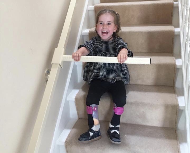 A child using the StairSteady.