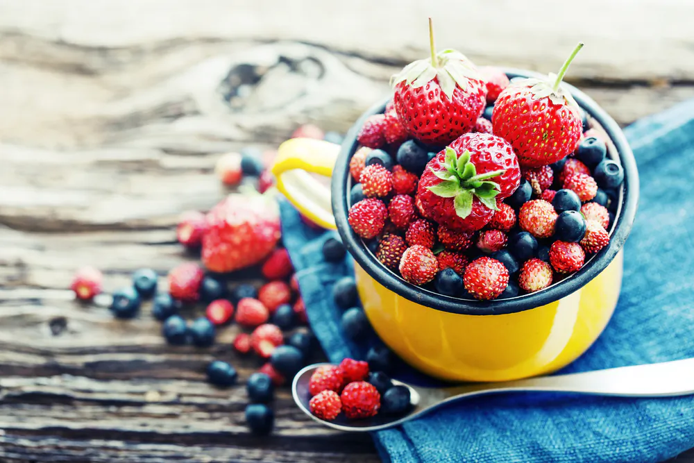 Strawberries, raspberries, black currants, red currants, blackberries, and blueberries can be jumbled into a pot and cooked down into a red berry soup. (iravgustin/Shutterstock)