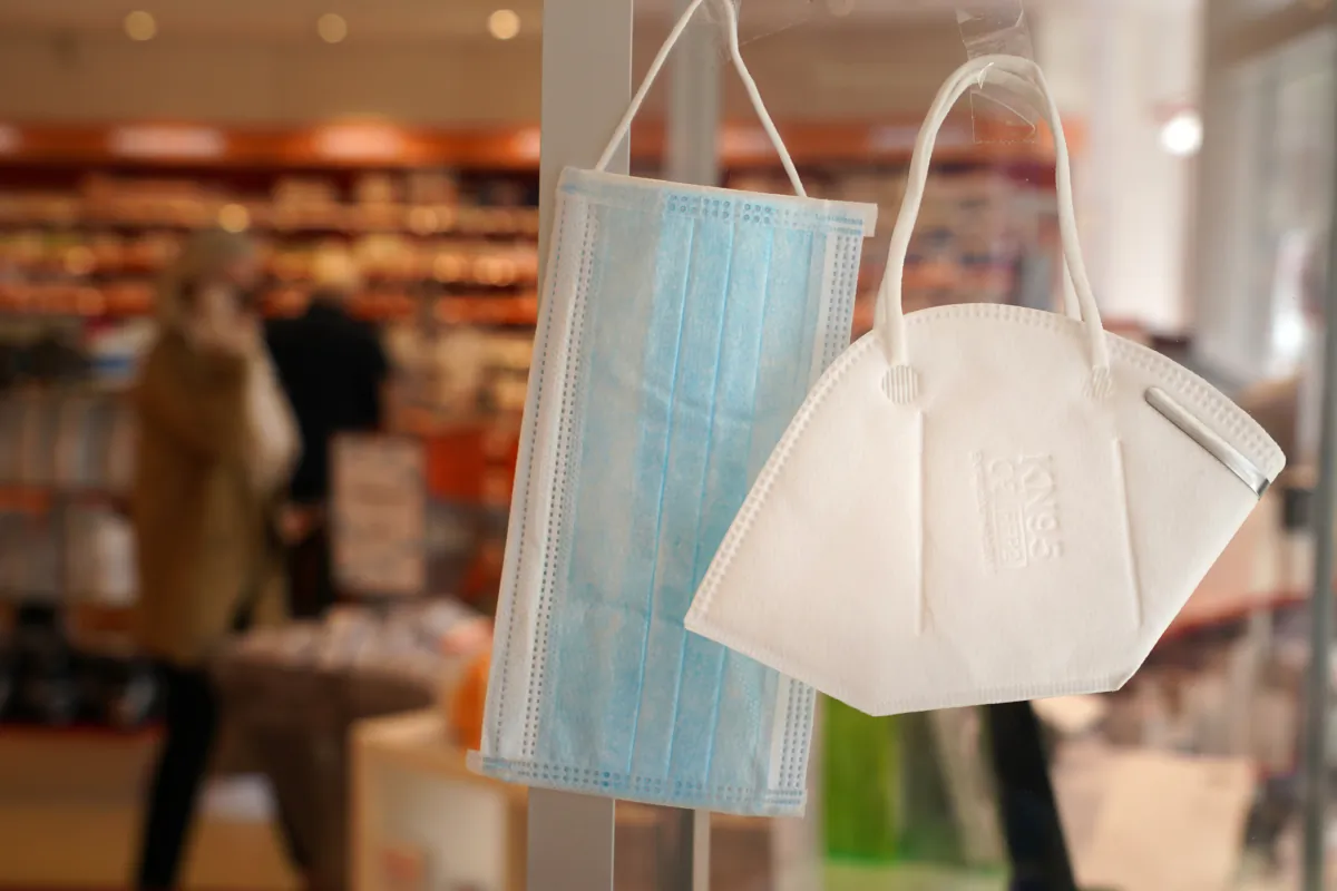 A surgical mask and an N95 mask hang on display for sale at a pharmacy during the novel coronavirus crisis in Berlin on April 22, 2020. (Sean Gallup/Getty Images)