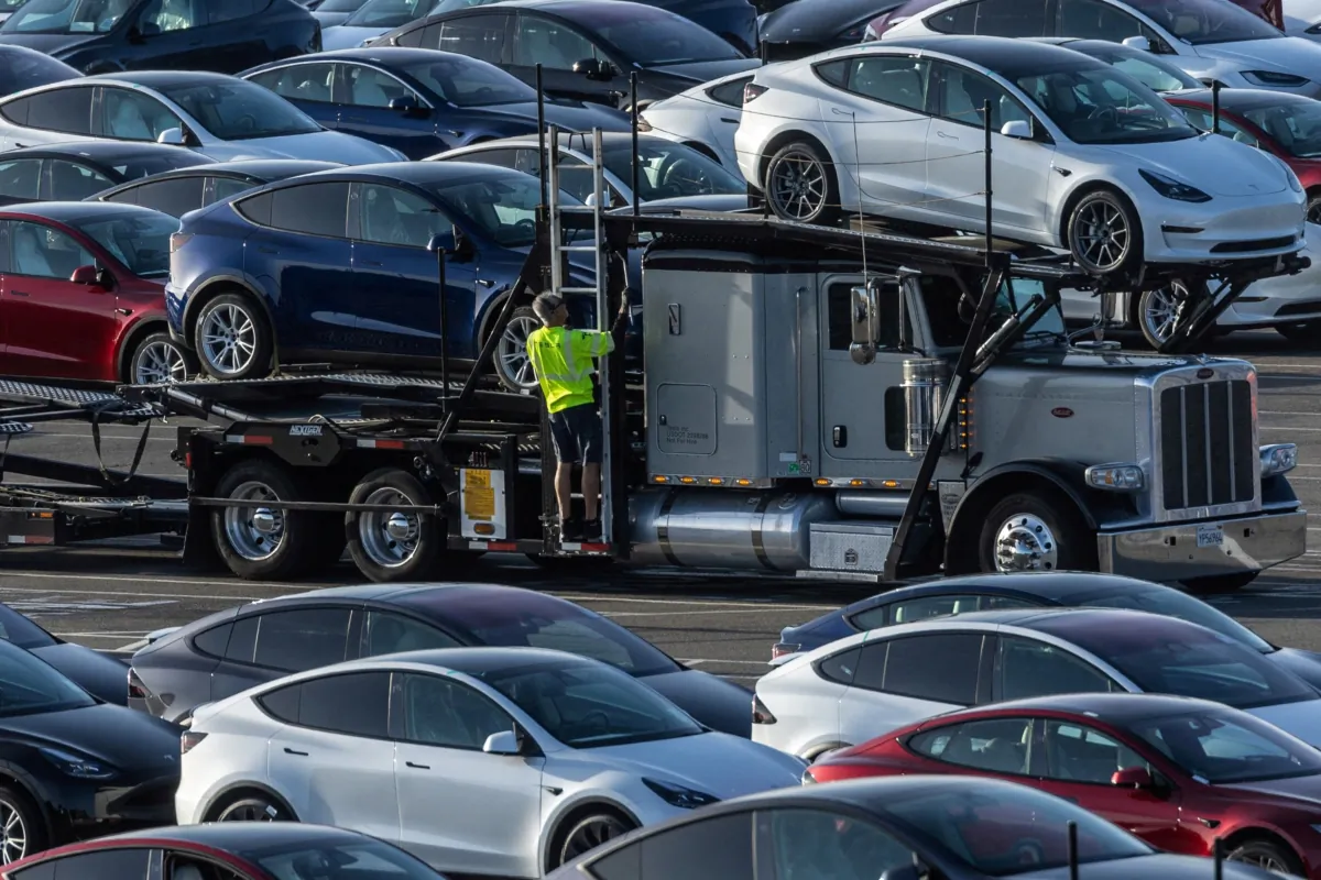 Tesla Model 3 vehicles for sale at a Tesla facility in Fremont, Calif., on May 23, 2023. (Carlos Barria/Reuters)