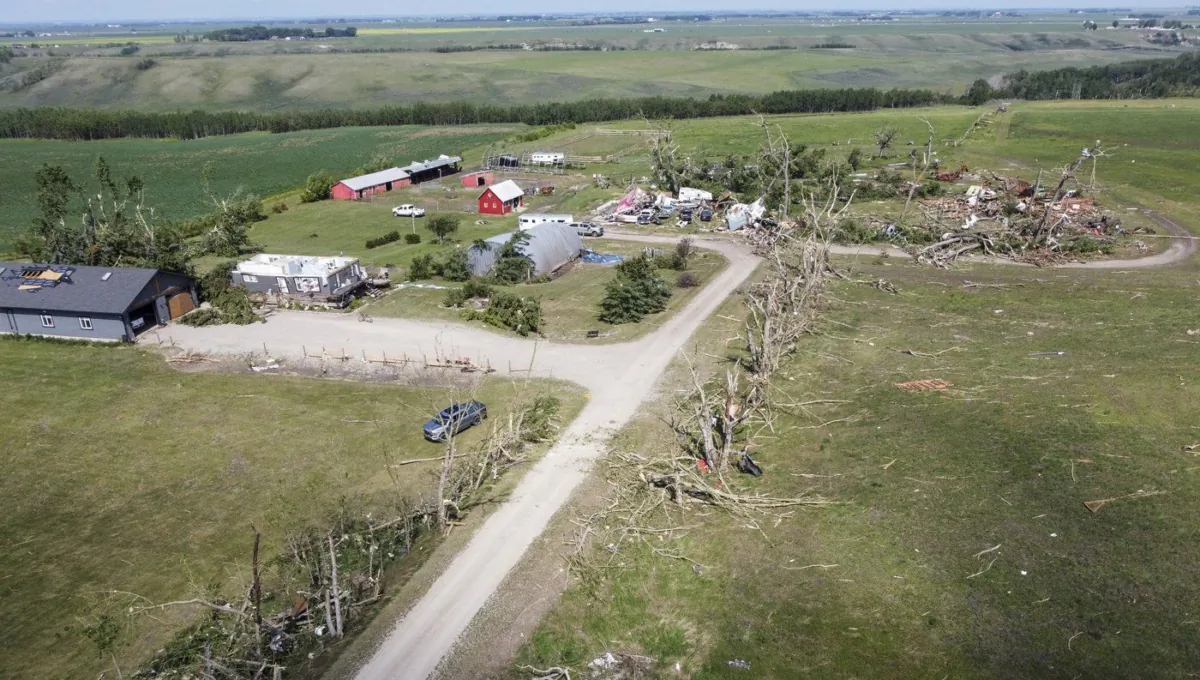 Tornado damaged homes are seen near Carstairs, Alta., July 1, 2023. (The Canadian Press/Jeff McIntosh)

