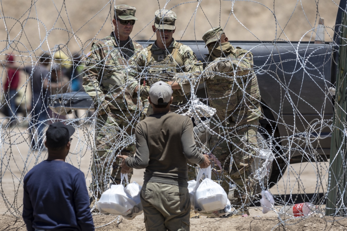 NextImg:CBP Defends Footage of Border Patrol Agent Cutting Razor Wire to Let in Illegal Border Crossers