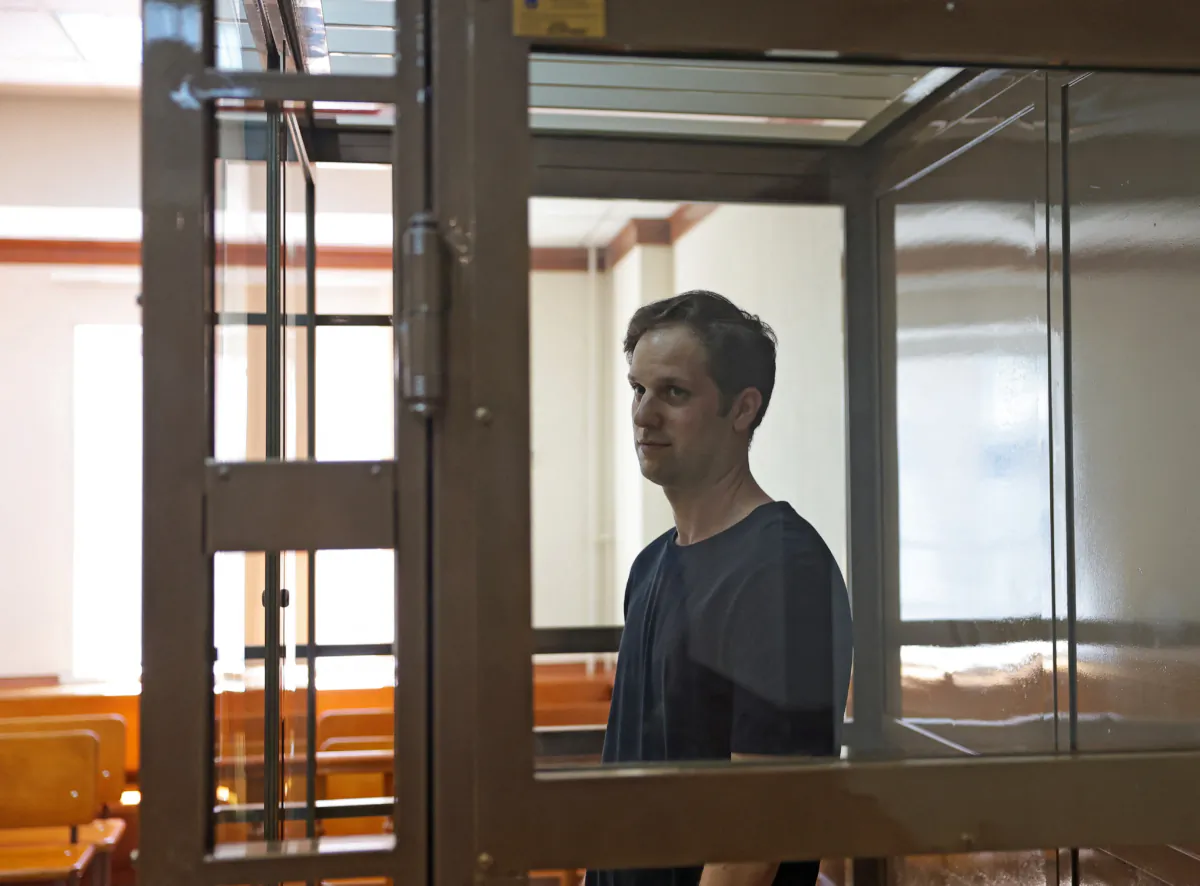 Reporter Evan Gershkovich, who was arrested in March while on a reporting trip and accused of espionage, stands before a court hearing to consider an appeal against his detention in Moscow, on June 22, 2023. (Evgenia Novozhenina/Reuters)
