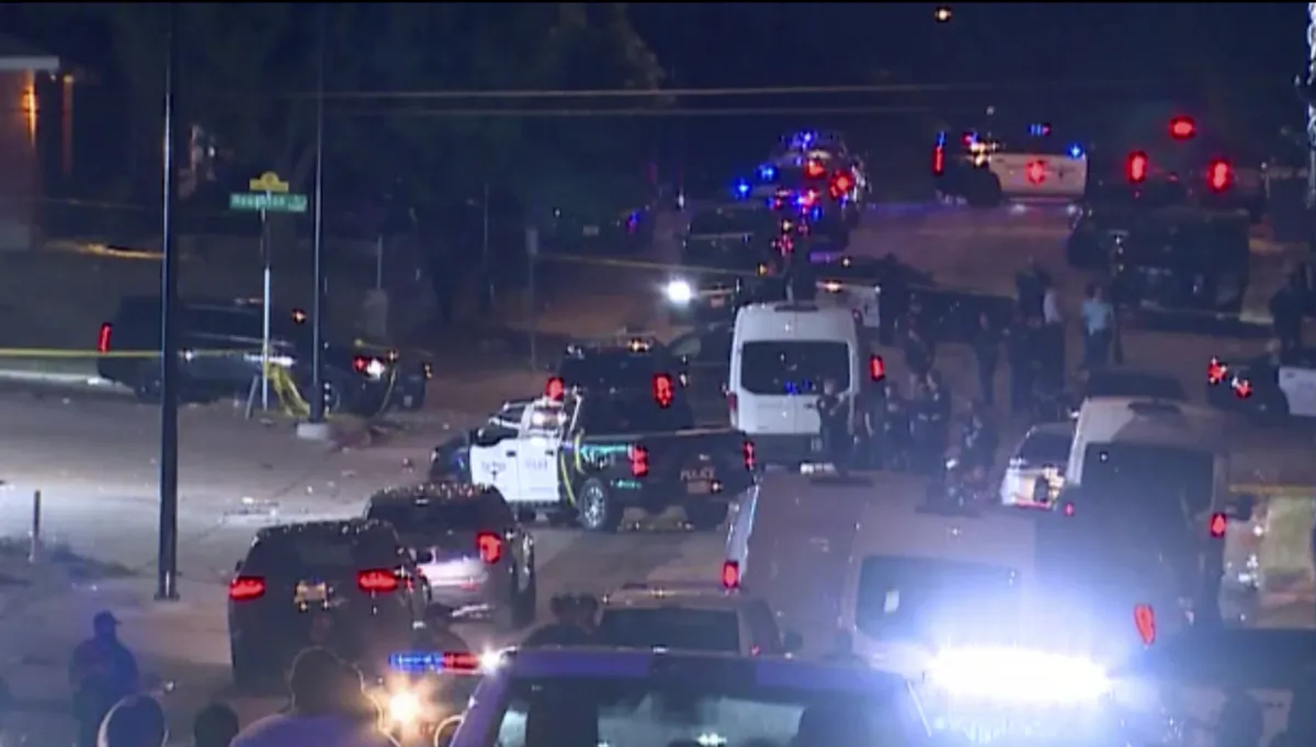 Police arrive on the scene of a deadly shooting in Forth Worth, Texas, late on July 3, 2023. (WFAA via AP)