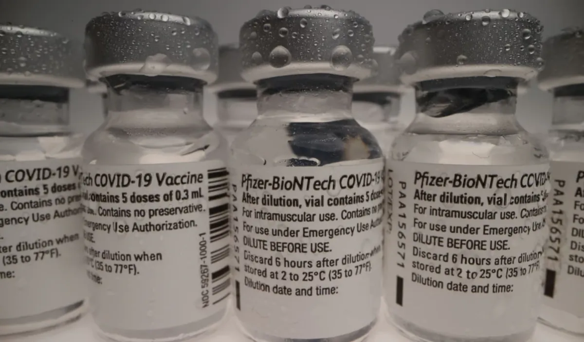 Pfizer-BioNTech COVID-19 vaccine vials are seen in Darmstadt, Germany, on March 2, 2021. (cortex-film/Shutterstock)