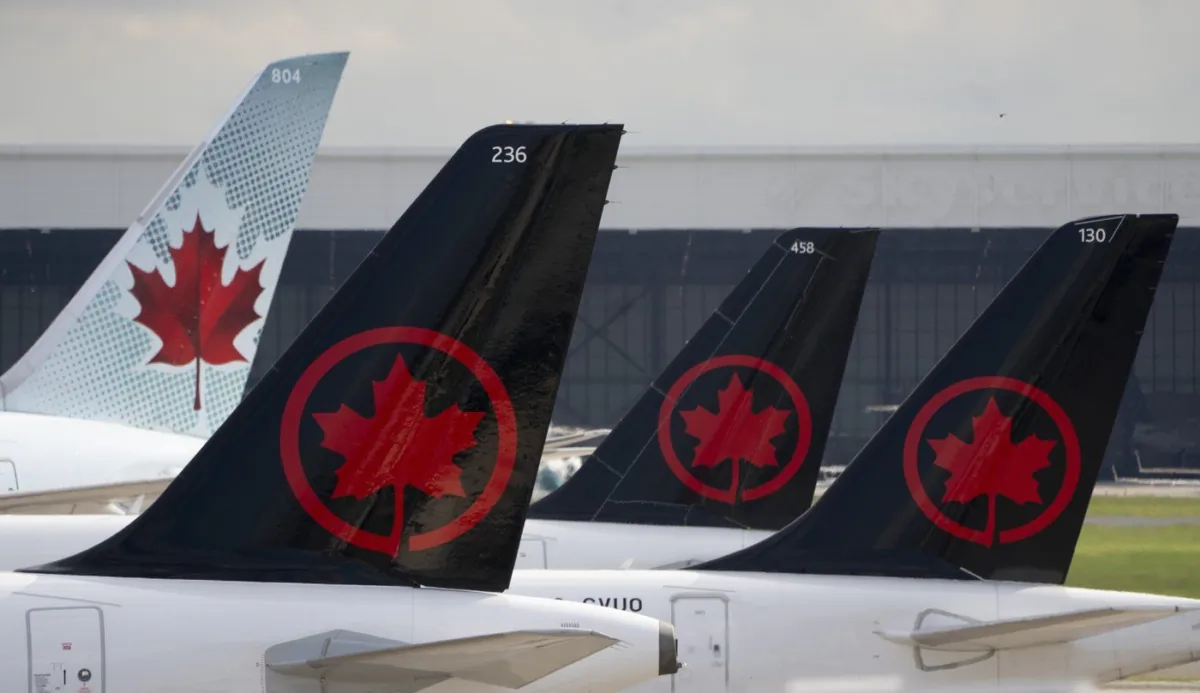 Figures from aviation tracker FlightAware show that nearly 2,000 Air Canada flights were delayed or cancelled over the Canada Day long weekend. (The Canadian Press/Adrian Wyld)