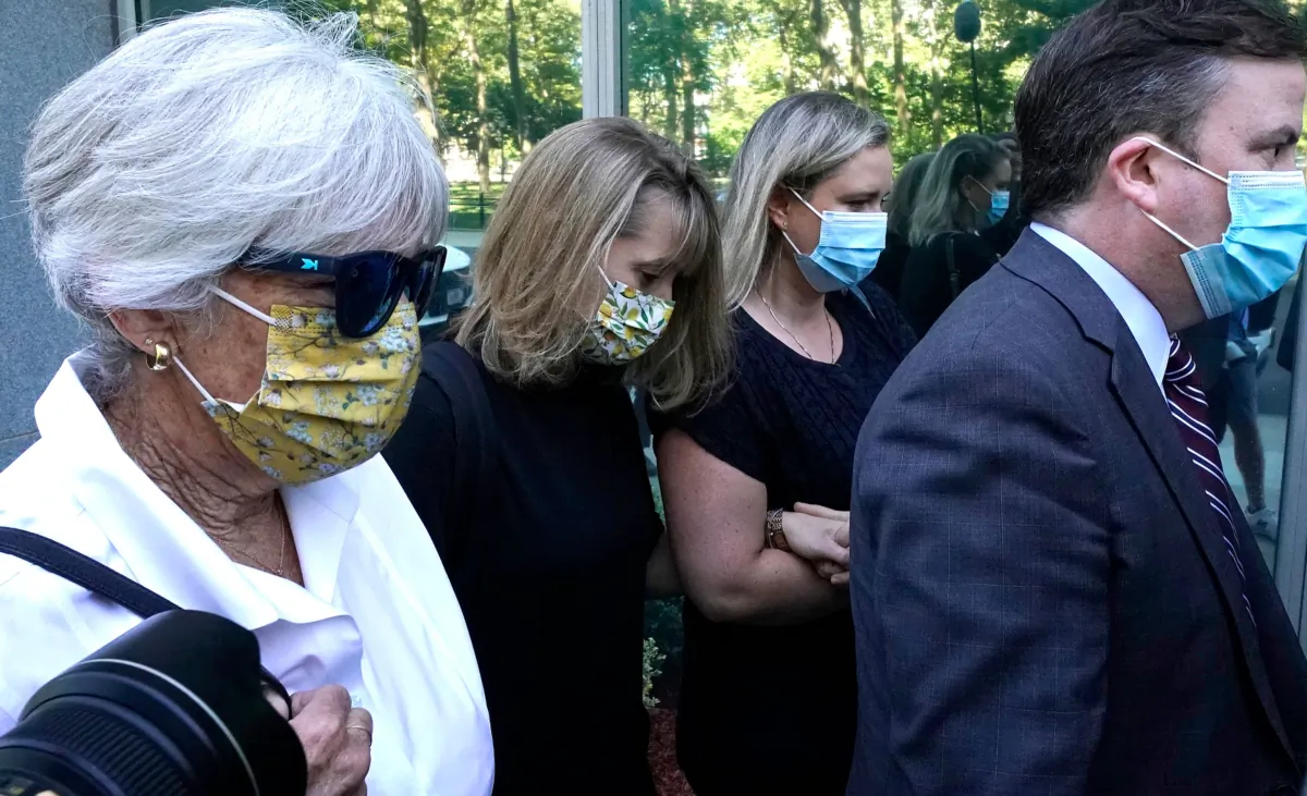 German-born American TV actress Allison Mack (C) arrives at Brooklyn Federal Court to be sentenced for her role in the alleged sex cult NXIVM, in New York, on June 30, 2021. (Timothy A. Clary/AFP via Getty Images)