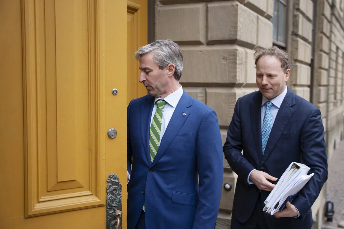 Nova Scotia Premier Tim Houston, left, and Finance and Treasury Board Minister Allan MacMaster enter the legislature before tabling the provincial budget, in Halifax, on Mar. 23, 2023. (The Canadian Press/Darren Calabrese)