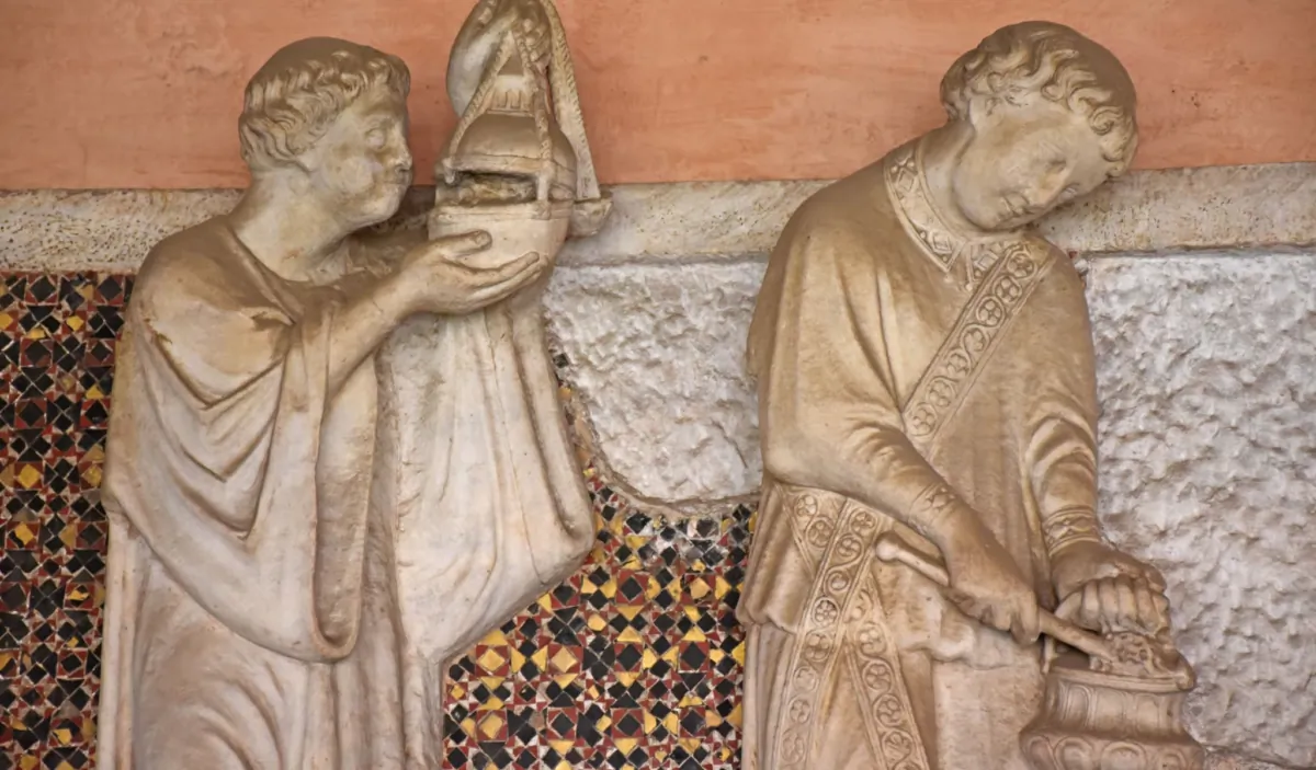 The Basilica of San Giovanni in Laterano, Lateran Cloister, view and details of statues, sculptures, frescoes, mosaics, in Rome on May 19, 2018. (forben/Shutterstock)