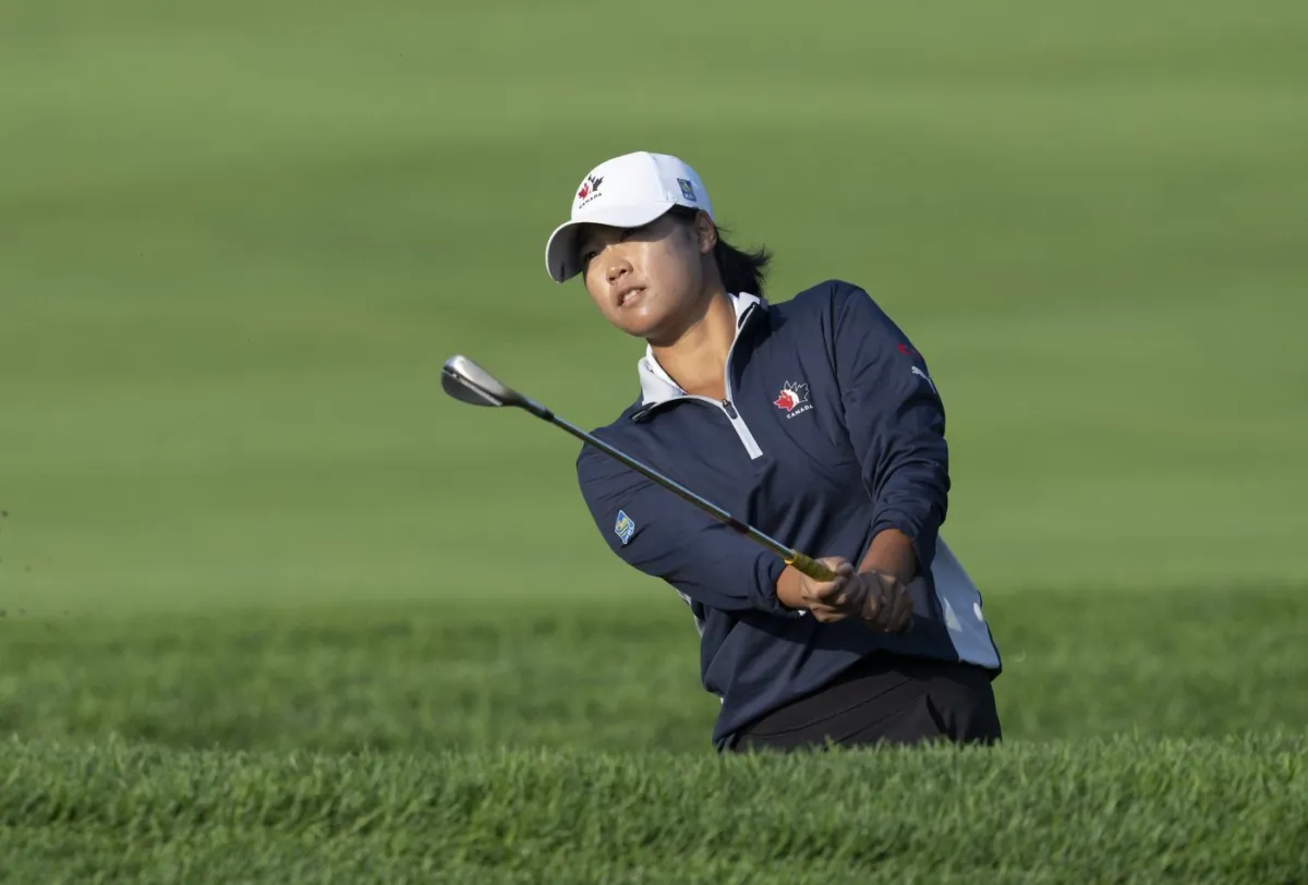 Canada's Monet Chun watches her shot land on the green on the third hole during the first day of action at the CP Women's Open, Aug. 25, 2022 in Ottawa. /(he Canadian PressAdrian Wyld)