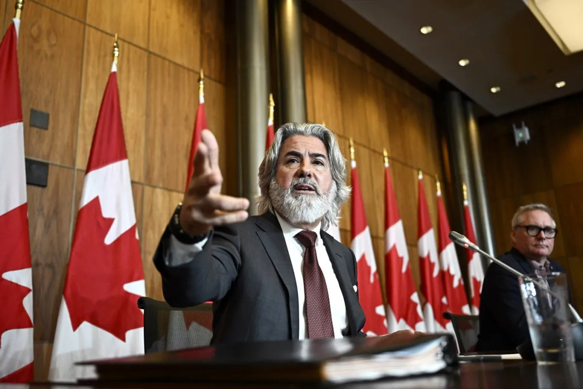 Then Heritage Minister Pablo Rodriguez (L) speaks at a news conference on Bill C-18, the Online News Act, along with Bloc MP Martin Champoux, in Ottawa on July 5, 2023. (The Canadian Press/Justin Tang)
