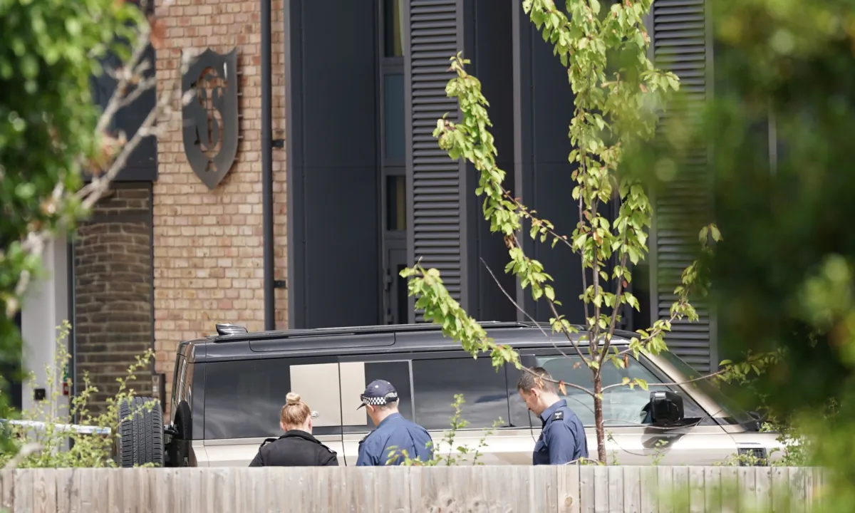A Land Rover Defender is seen inside the grounds of The Study Preparatory School in Camp Road, Wimbledon, where it has collided with a primary school building, in England on July 6, 2023. (Victoria Jones/PA)

