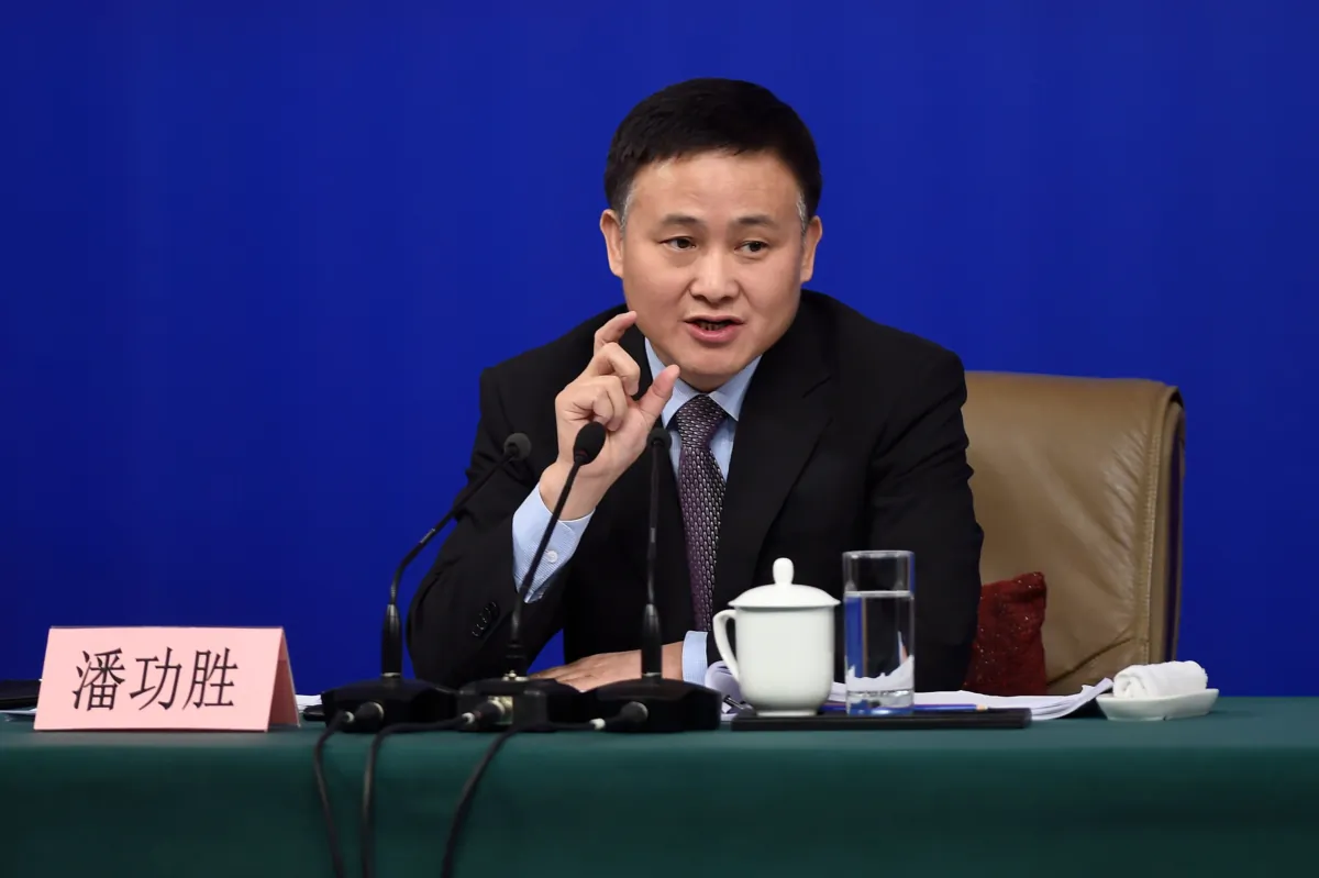 Pan Gongsheng, deputy governor of People's Bank of China and director of the State Administration of Foreign Exchange, answers a question at a press conference during the First Session of the 13th National People's Congress in Beijing on March 9, 2018. (Wang Zhao/AFP via Getty Images)
