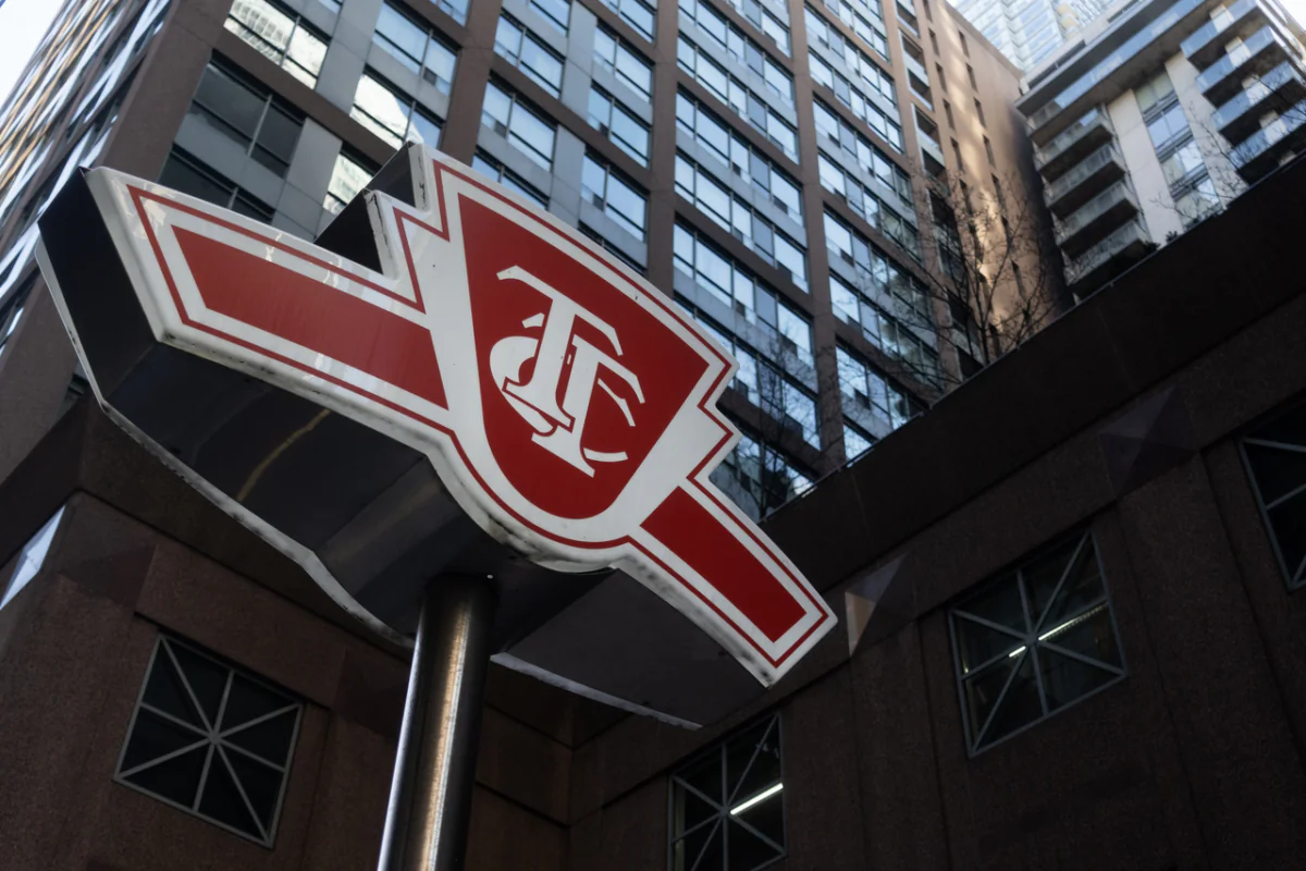 A Toronto Transit Commission sign is shown at a downtown Toronto subway in a file photo. (Graeme Roy/The Canadian Press)