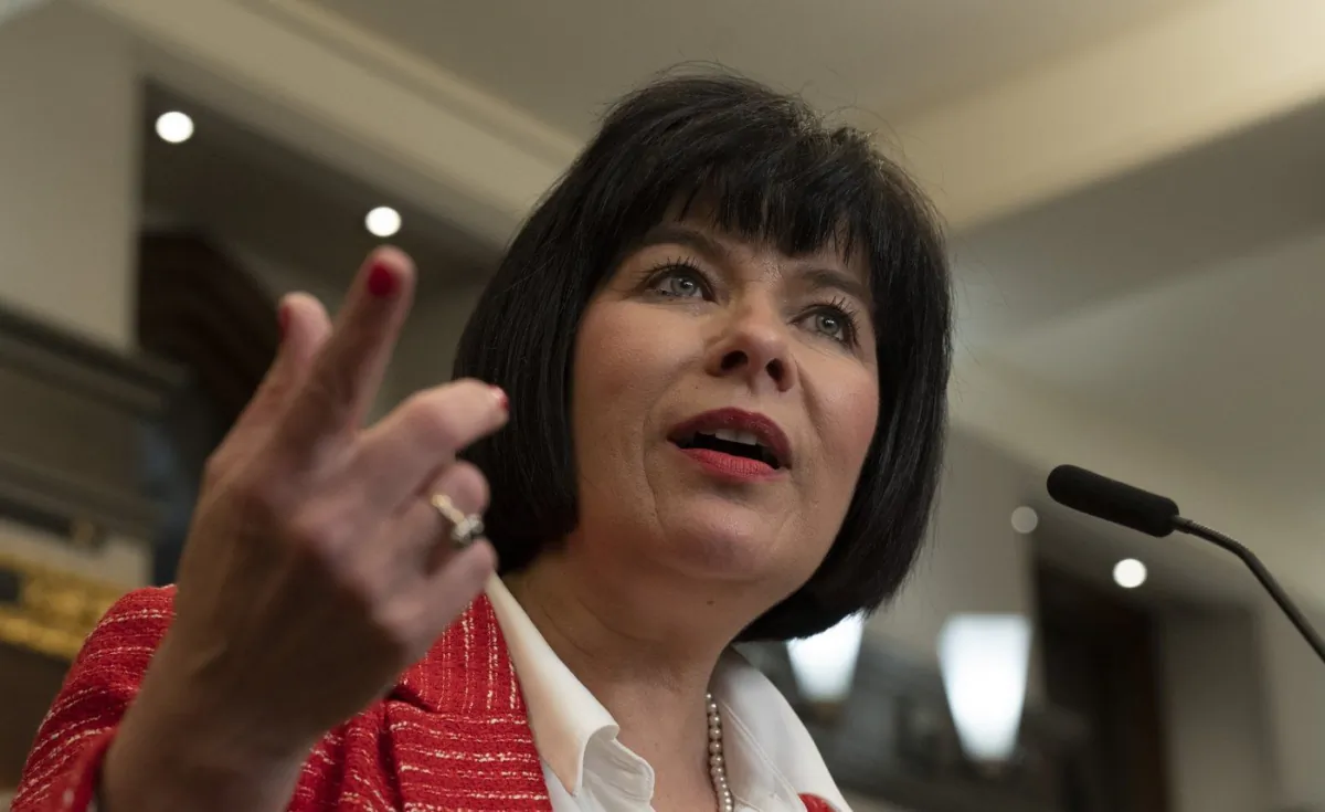 Minister of Official Languages Ginette Petitpas Taylor speaks to reporters in the Foyer of the House of Commons, in Ottawa, June 20, 2023. (The Canadian Press/Adrian Wyld)