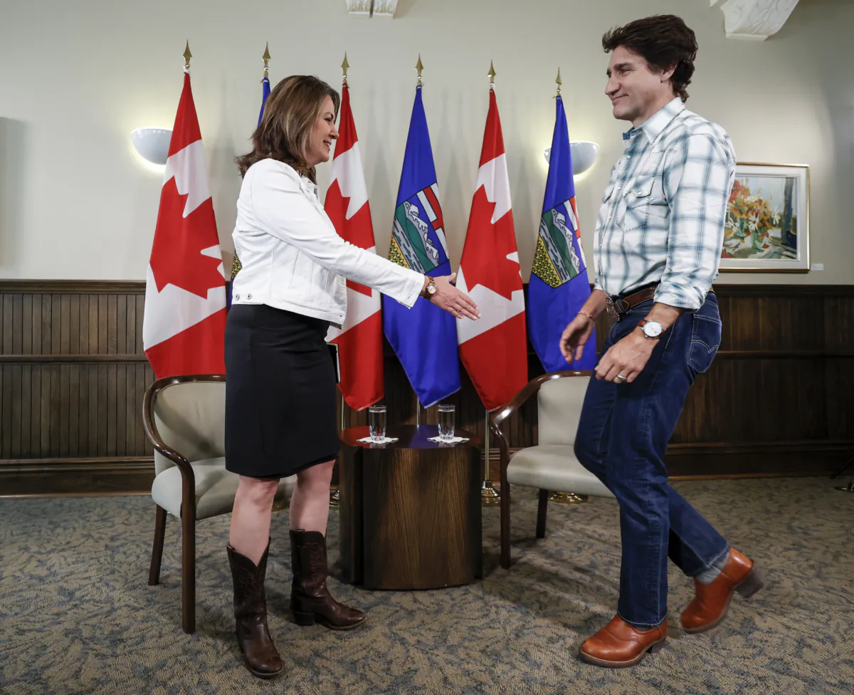 Prime Minister Justin Trudeau meets with Alberta Premier Danielle Smith in Calgary, Alta., on July 7, 2023. (Jeff McIntosh/The Canadian Press)