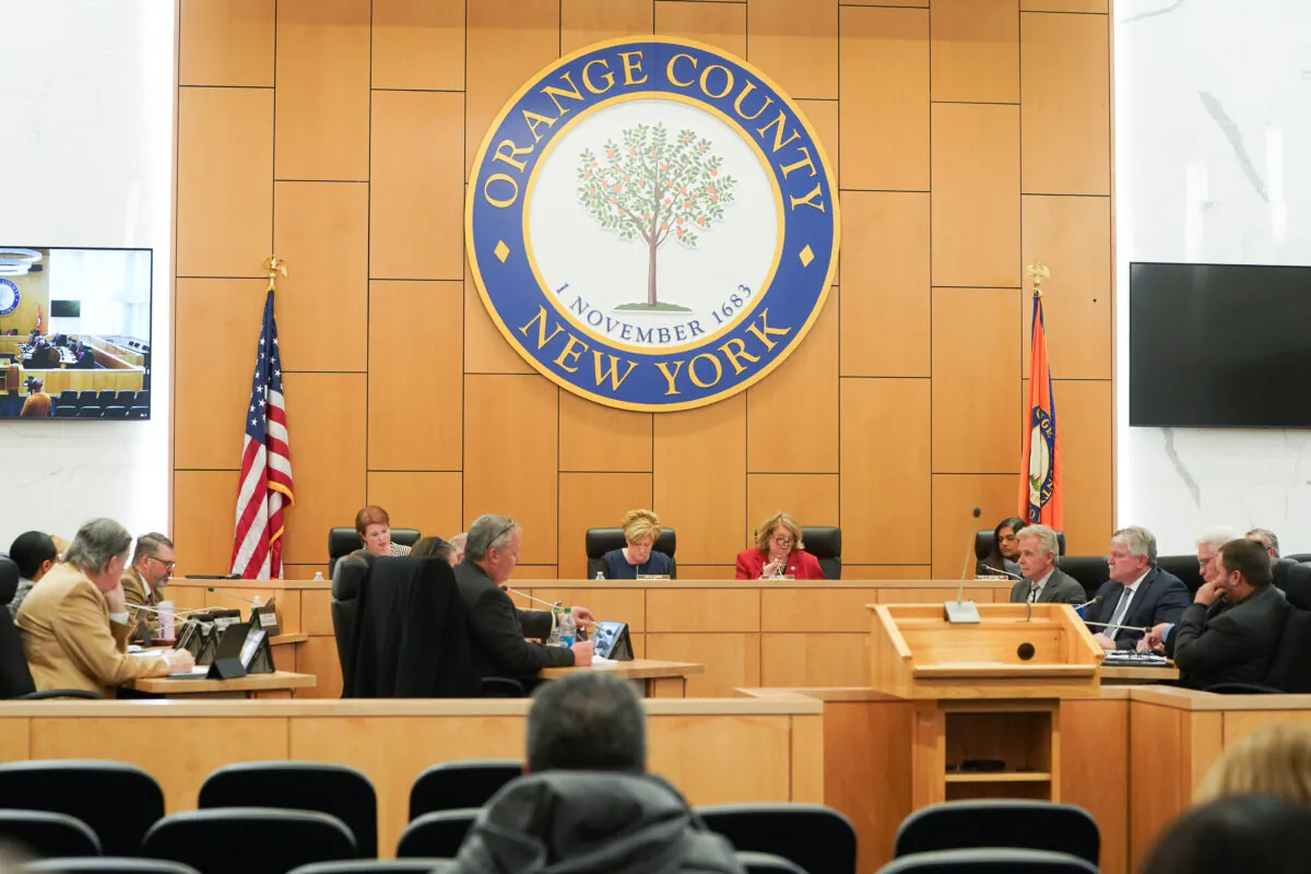 Orange County legislators interact during a regular legislative session in Goshen, N.Y., on Dec. 1, 2022. (Cara Ding/The Epoch Times)