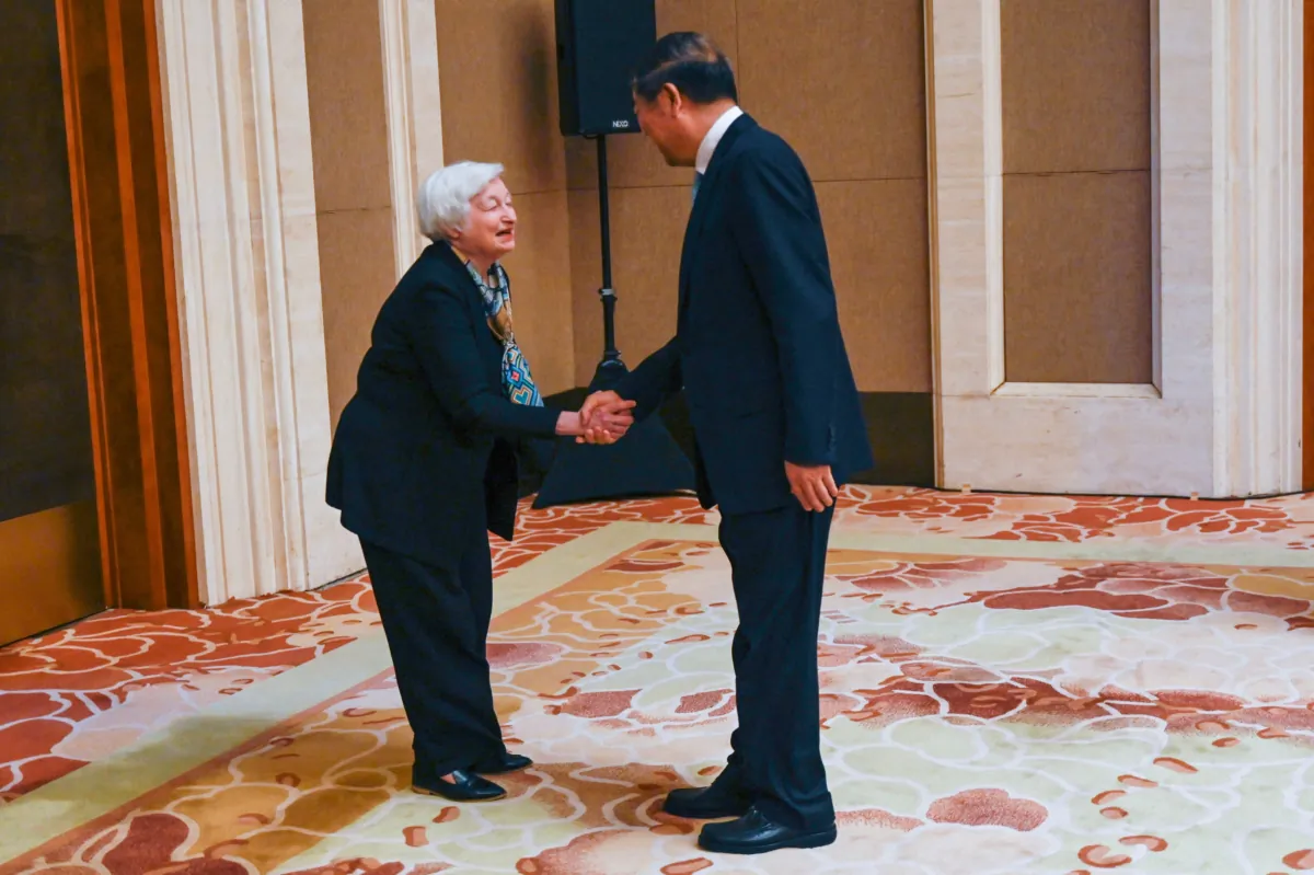U.S. Treasury Secretary Janet Yellen (L) shakes hands with Chinese Vice Premier He Lifeng during a meeting at the Diaoyutai State Guesthouse in Beijing, on July 8, 2023. (Pedro Pardo/POOL/AFP via Getty Images)