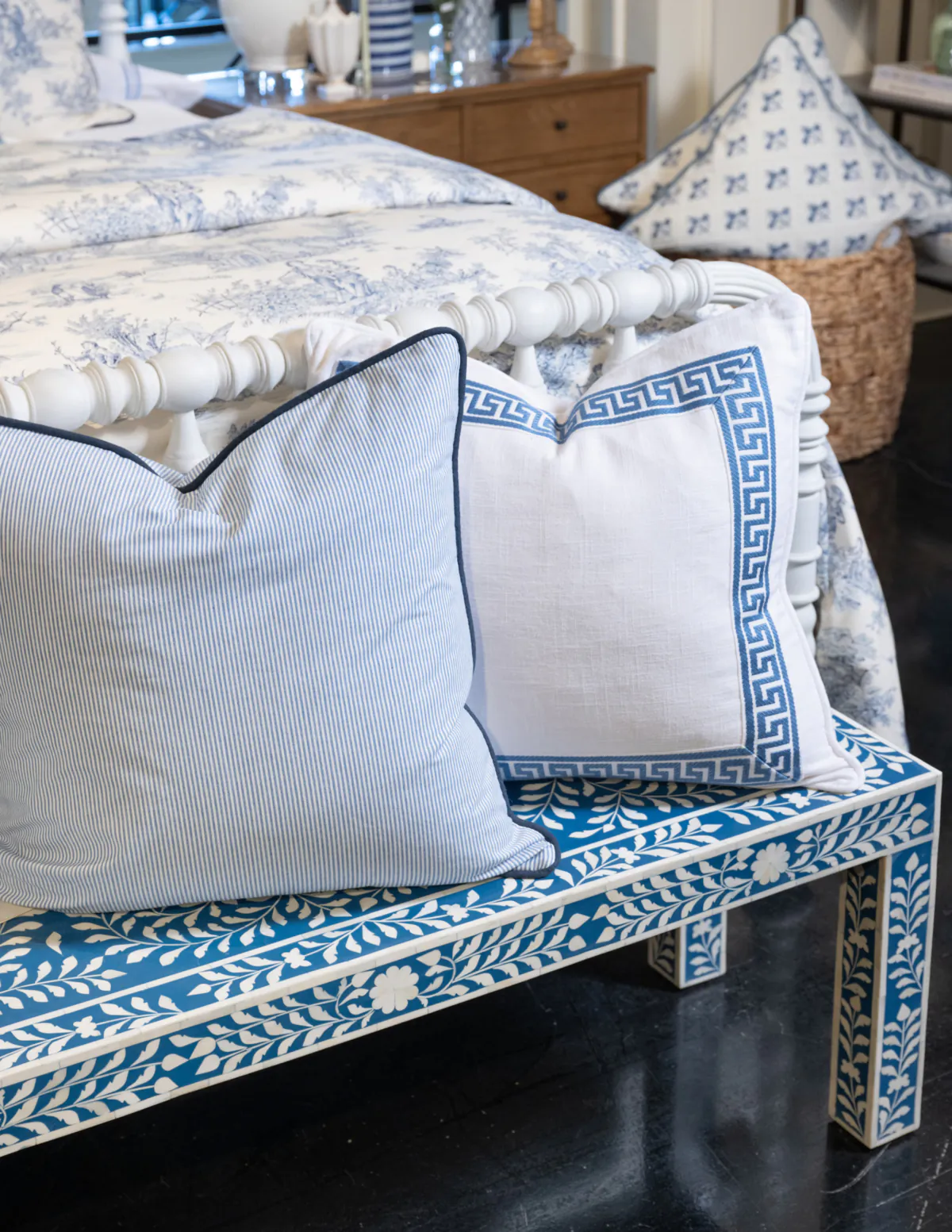 Box trim in a Greek key design is added to the face of the pillow on the right for a polished finished product. (Provided photo/TNS)
