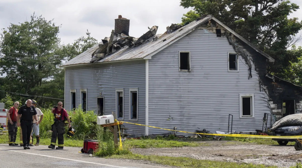 Emergency responders work the scene of a deadly house fire in New Scotland, N.Y., on July 8, 2023. (Jim Franco/The Albany Times Union via AP)