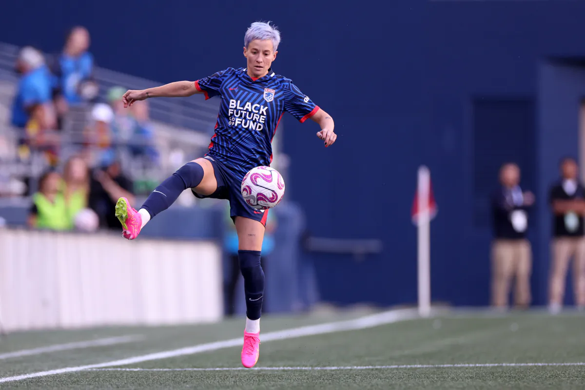 Megan Rapinoe (15) of OL Reign controls the ball against the Portland Thorns FC at Lumen Field in Seattle on June 3, 2023. (Steph Chambers/Getty Images)