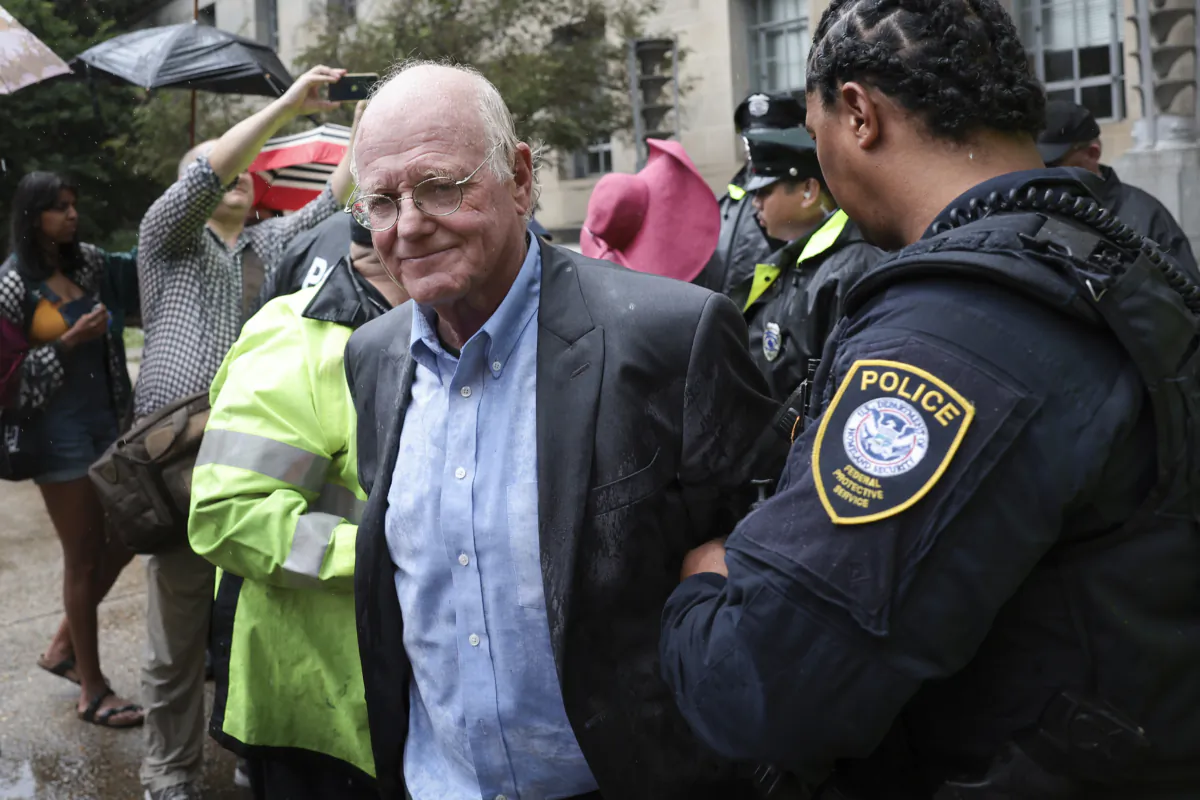Ben Cohen, co-founder of Ben & Jerry’s ice cream, is arrested outside the Department of Justice in Washington on July 6, 2023. (Win McNamee/Getty Images)