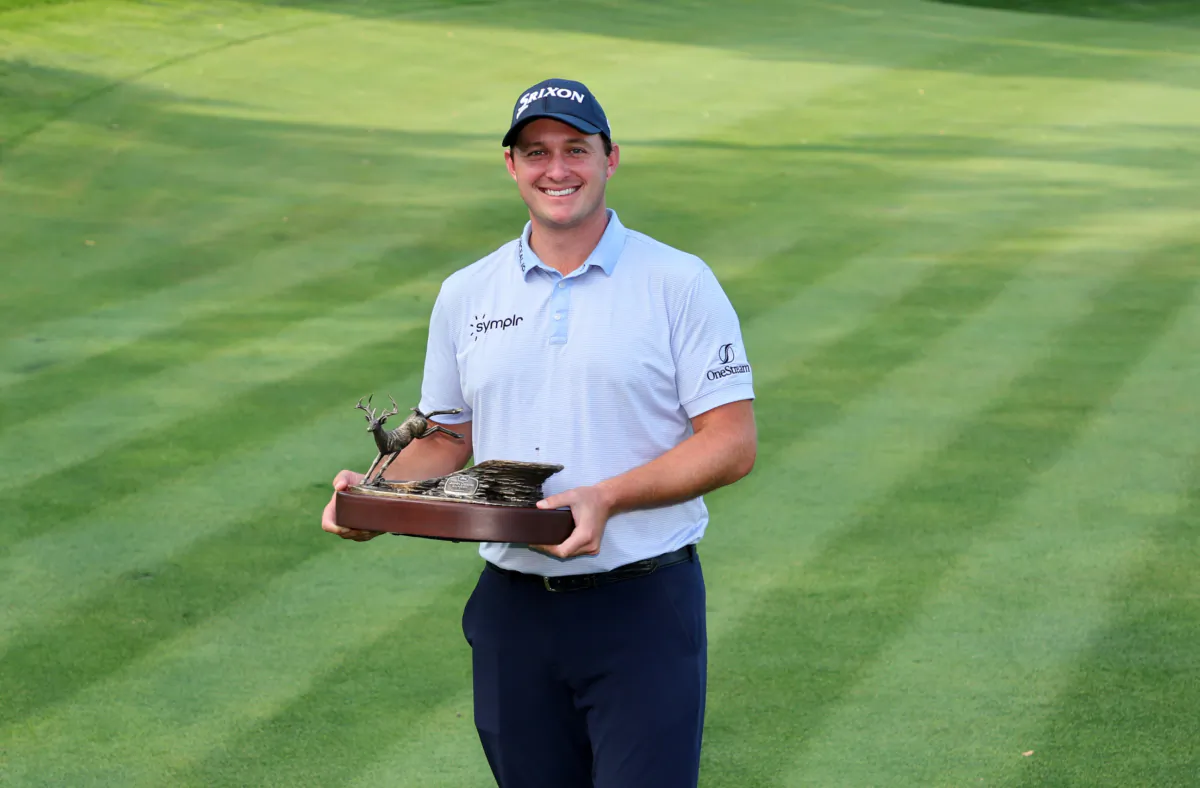 Sepp Straka of Austria poses with the trophy after winning the John Deere Classic at TPC Deere Run in Silvis, Illinois, on July 9, 2023. (Stacy Revere/Getty Images)
