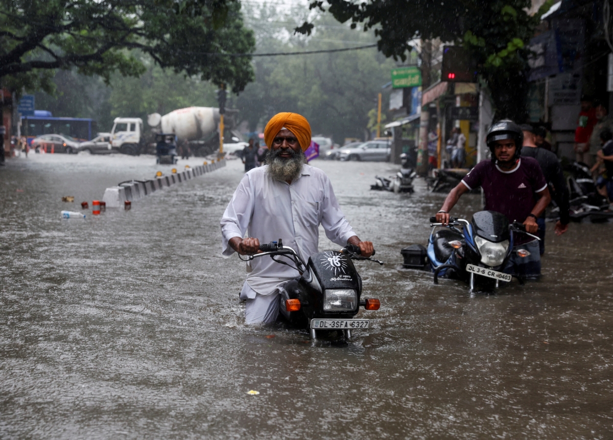 NextImg:Torrential Rain, Floods Kill 22 Across Northern India