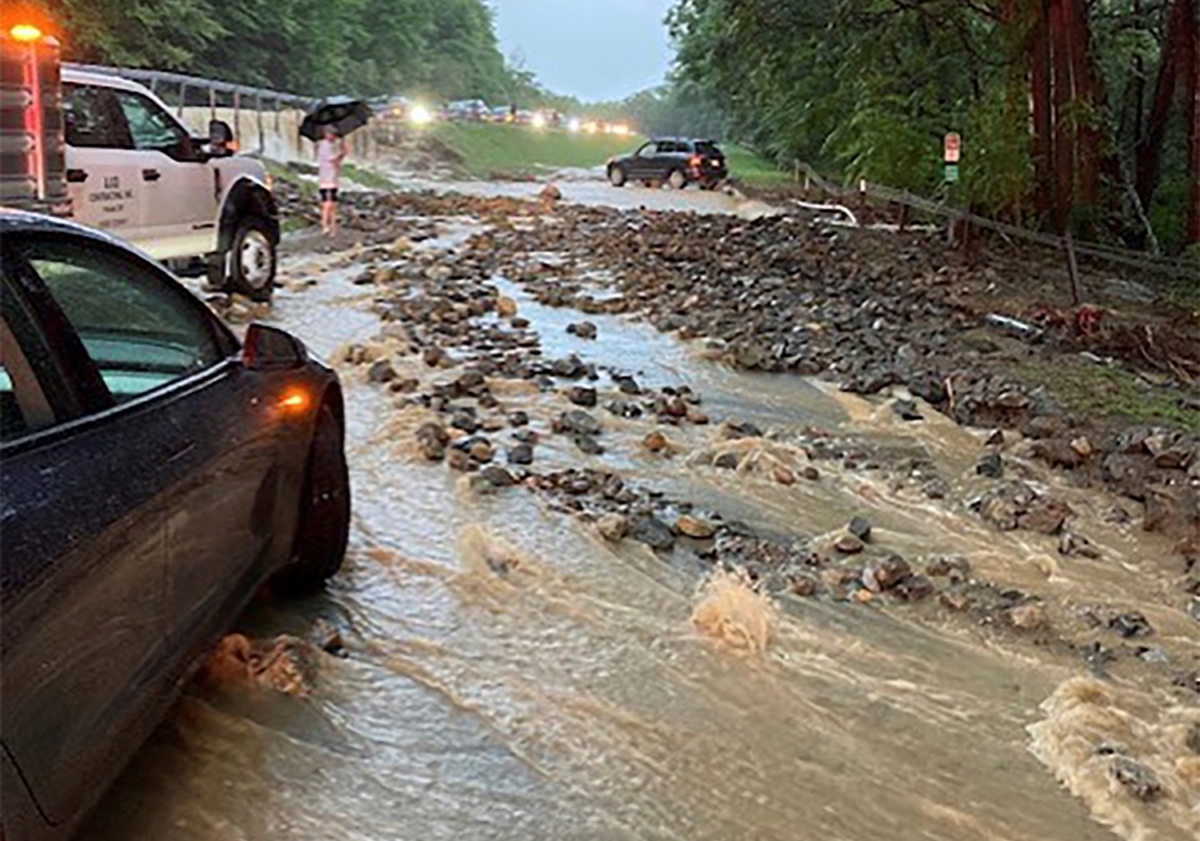 NextImg:Extreme Flooding Overwhelms New York Roadways and Kills 1 Person