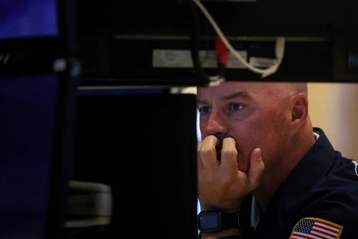 A trader works on the floor of the New York Stock Exchange (NYSE) in New York City on July 7, 2023. (Brendan McDermid/Reuters)