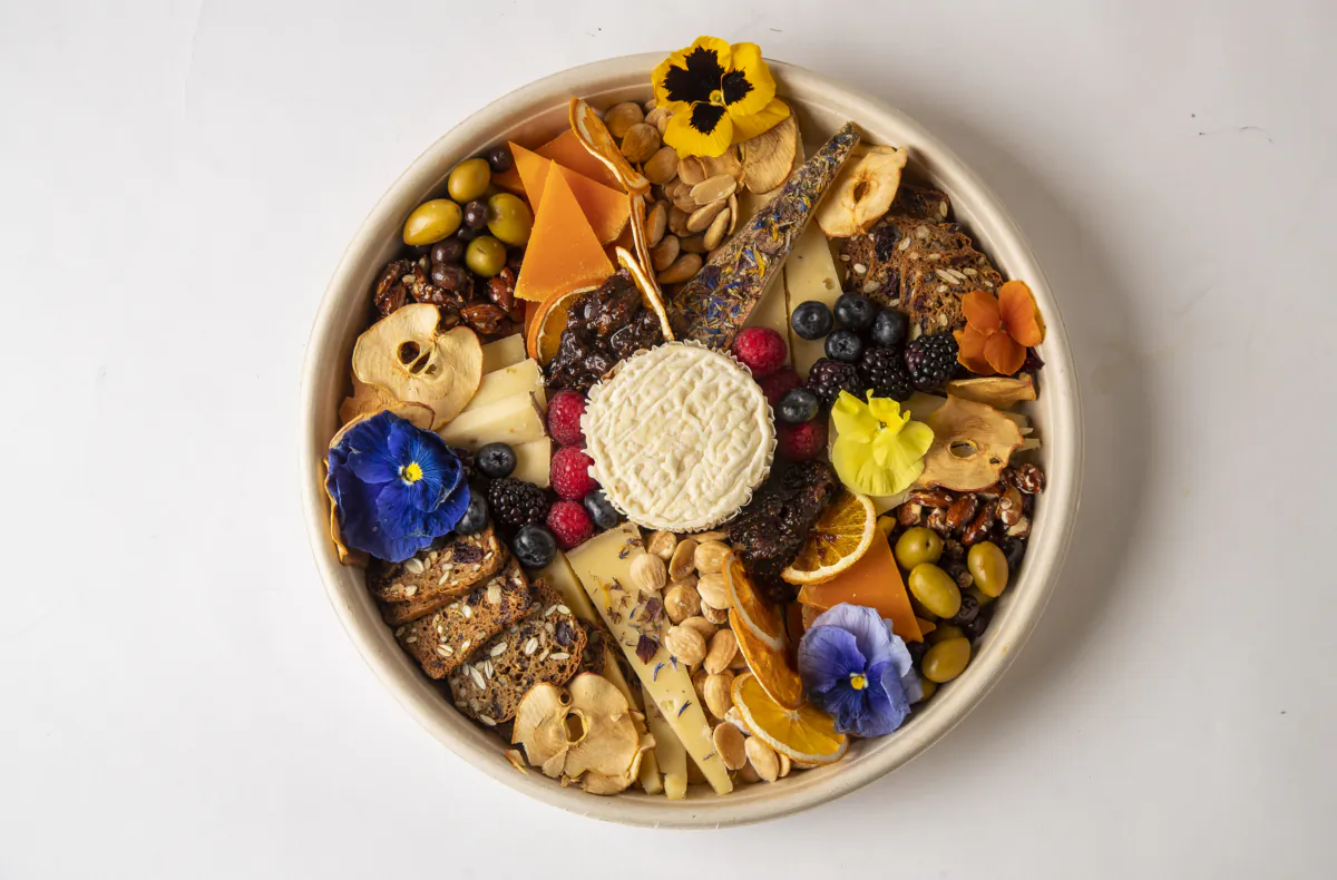 You'll find that some of your garden flowers can pull double duty and turn your summer spreads into works of art. (Leila Navidi/Minneapolis Star Tribune/TNS)
