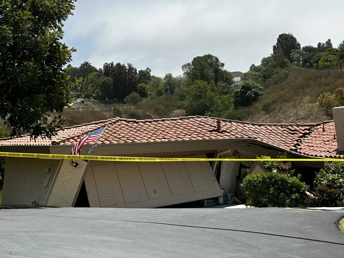 A home collapsing from a landslide in the neighborhood of Rolling Hills Estates in Los Angeles County, Calif., on July 9, 2023. (Courtesy of Los Angeles County Supervisor Janice Hahn)