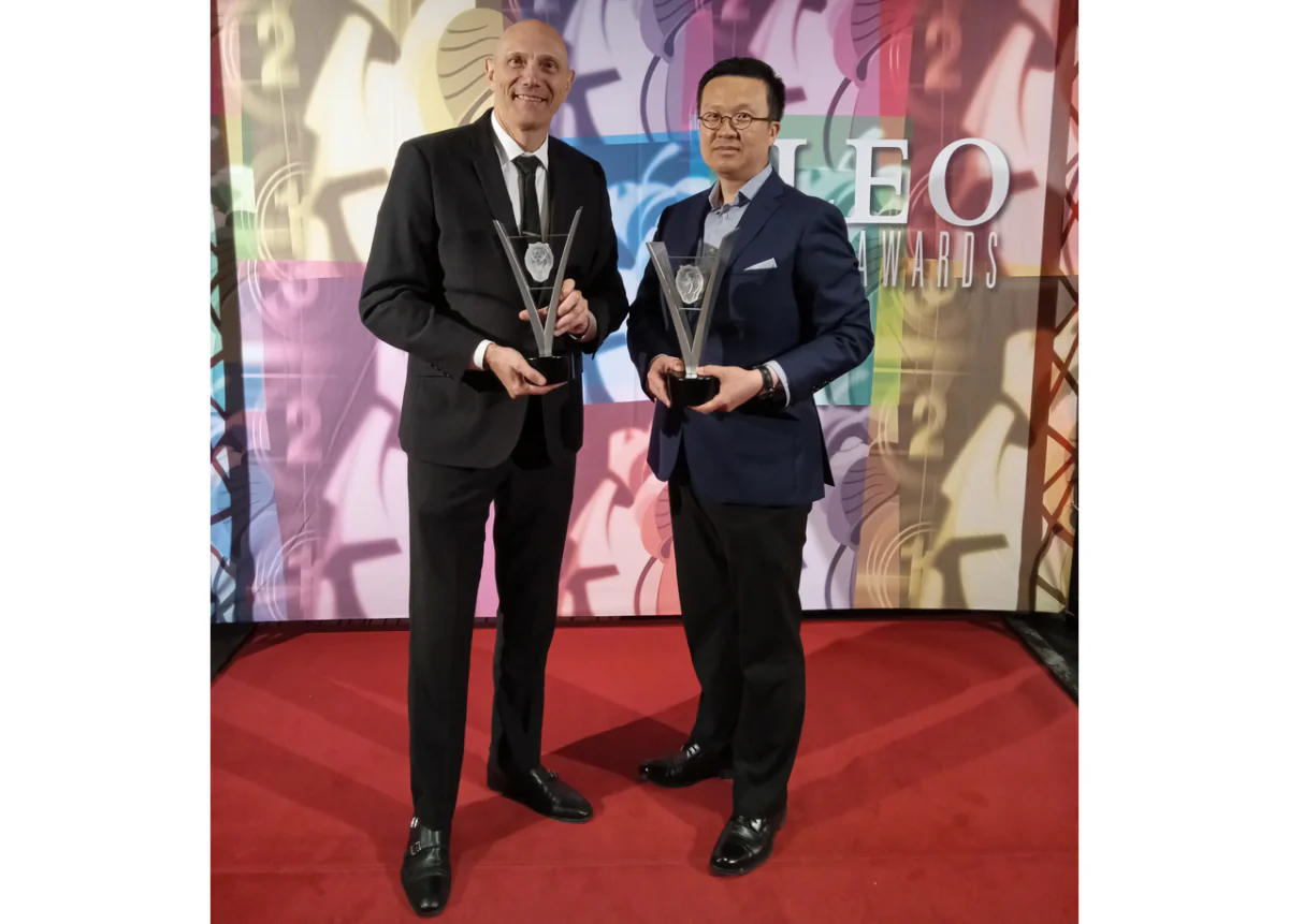 “State Organs” film score composer Daryl Bennett (L) and director Raymond Zhang hold their Leo Awards during an award ceremony in Vancouver on July 9, 2023. (Courtesy of Rooyee Films)