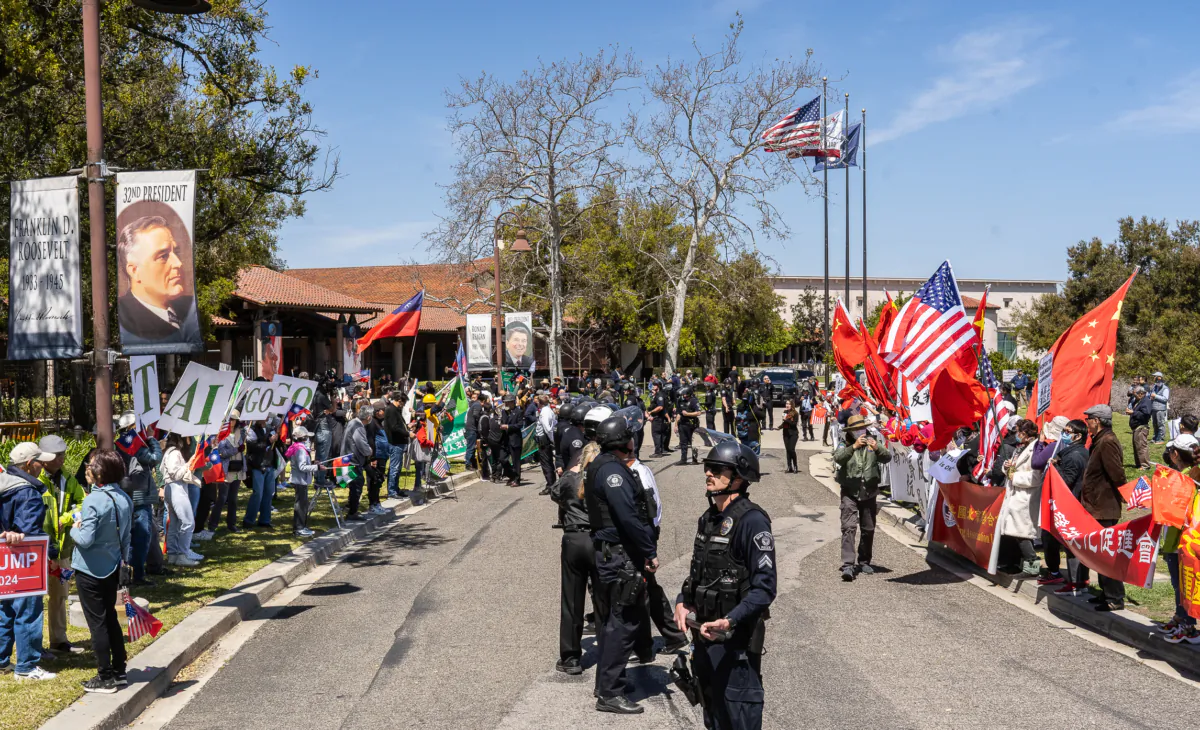 Pro-Taiwan and Pro-CCP protestors face off at The Regan Presidential Library in Semi Valley, Calif., on April 5, 2023. (John Fredricks/The Epoch Times)