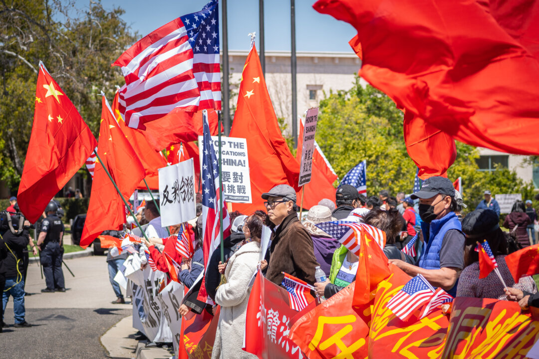 Pro-China supporters protest the arrival of Taiwan President Tsai Ing-wen at the Ronald Reagan Presidential Library in Simi Valley, Calif., on April 5, 2023. (John Fredricks/The Epoch Times)