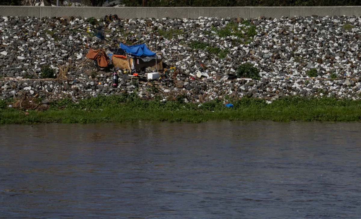 Homeless encampments line the Los Angeles River in Long Beach, Calif., on March 1, 2023. (John Fredricks/The Epoch Times)
