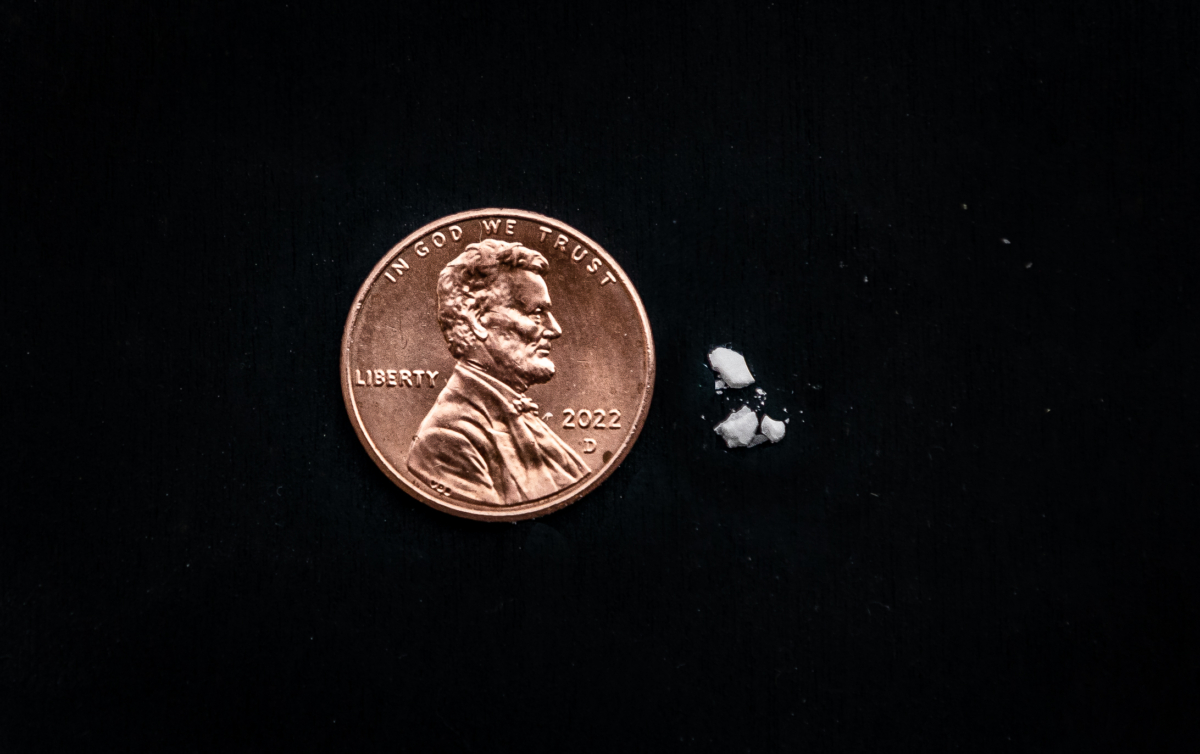 Mock sizing of a potentially lethal dose of fentanyl, on April 1, 2022. (John Fredricks/The Epoch Times)