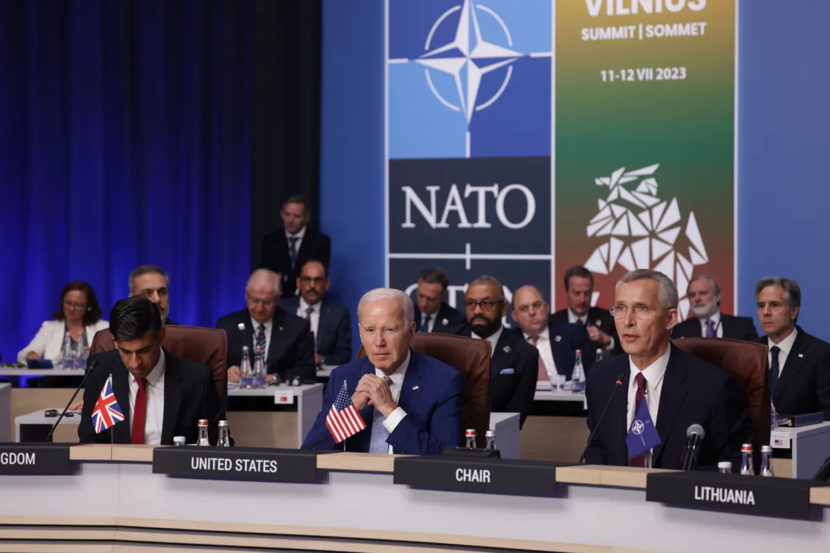 (L-R) British Prime Minister Rishi Sunak, US President Joe Biden and NATO Secretary General Jens Stoltenberg attend the first day of the 2023 NATO Summit  in Vilnius, Lithuania on July 11, 2023. (Sean Gallup/Getty Images)