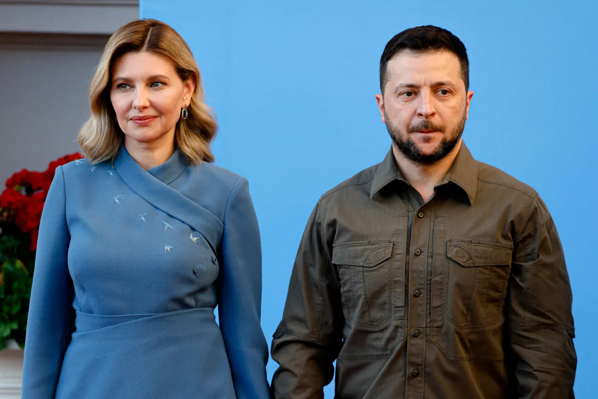 Ukrainian President Volodymyr Zelenskyy (R) and his wife, Olena Zelenska, in Vilnius on July 11, 2023. (Ludovic Marin/AFP via Getty Images)