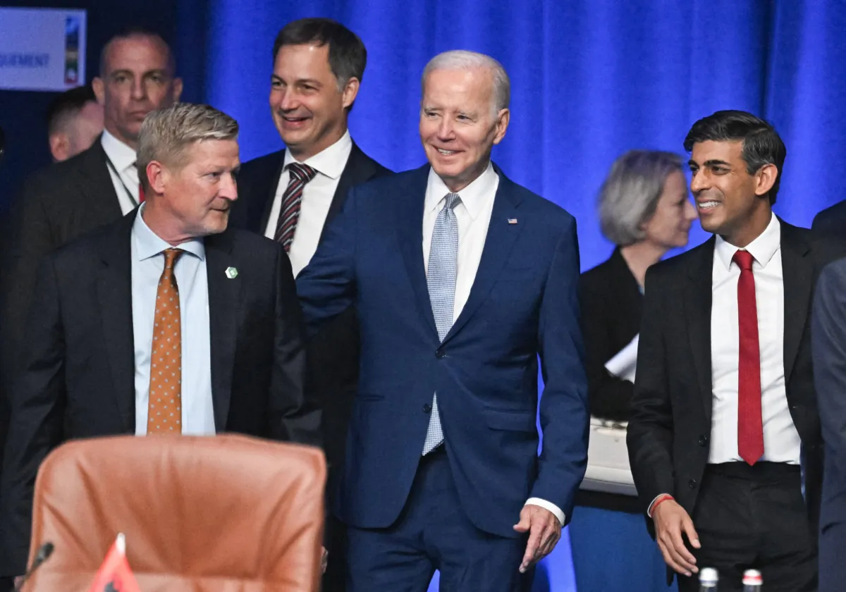 President Joe Biden (C) and UK Prime Minister Rishi Sunak (R) arrive to attend the first work session as part of the North Atlantic Treaty Organization (NATO) summit, in Vilnius on July 11, 2023. NATO leaders will grapple with Ukraine's membership ambitions at their summit on July 11, 2023. (Jacques Witt/AFP via Getty Images)