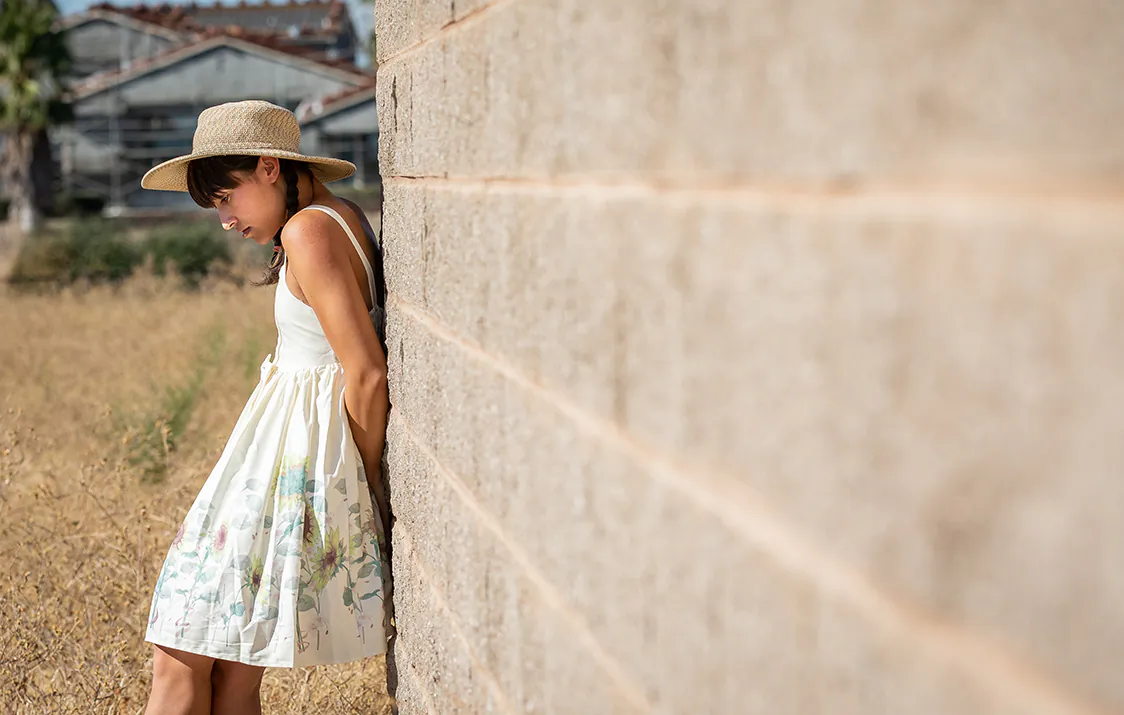 Chole Cole, an adult who regrets her gender transition procedures as a minor, stands near her home in Northern California on Aug. 26, 2022. (John Fredricks/The Epoch Times)