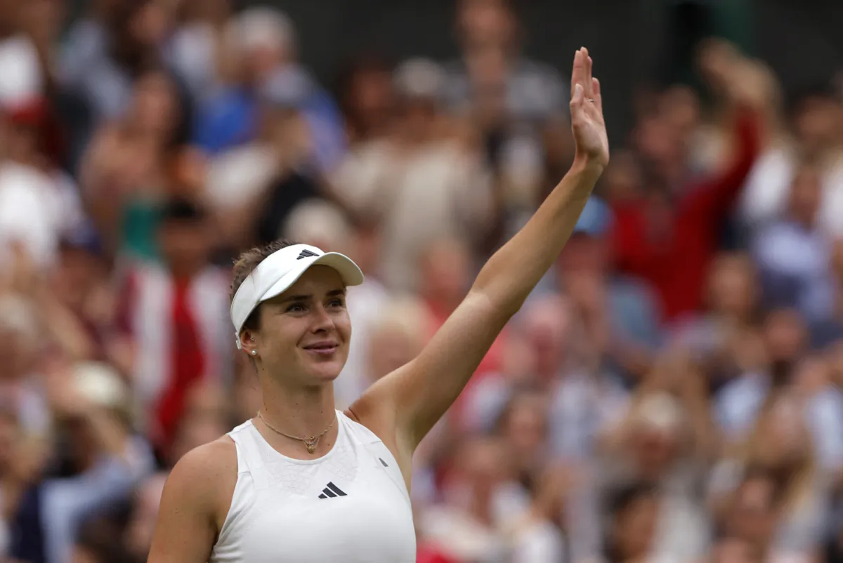 Ukraine's Elina Svitolina celebrates winning her quarter final match against Poland's Iga Swiatek during the Tennis Wimbledon at All England Lawn Tennis and Croquet Club in London on July 11, 2023. (Andrew Couldridge/Reuters)