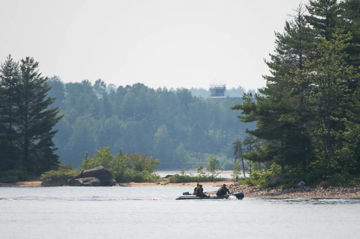 Canadian Armed Forces (CAF) conduct searches around a series of islands on the Ottawa River near Fort William in the Pontiac Regional County Municipality on June 20, 2023. (The Canadian Press/Spencer Colby)