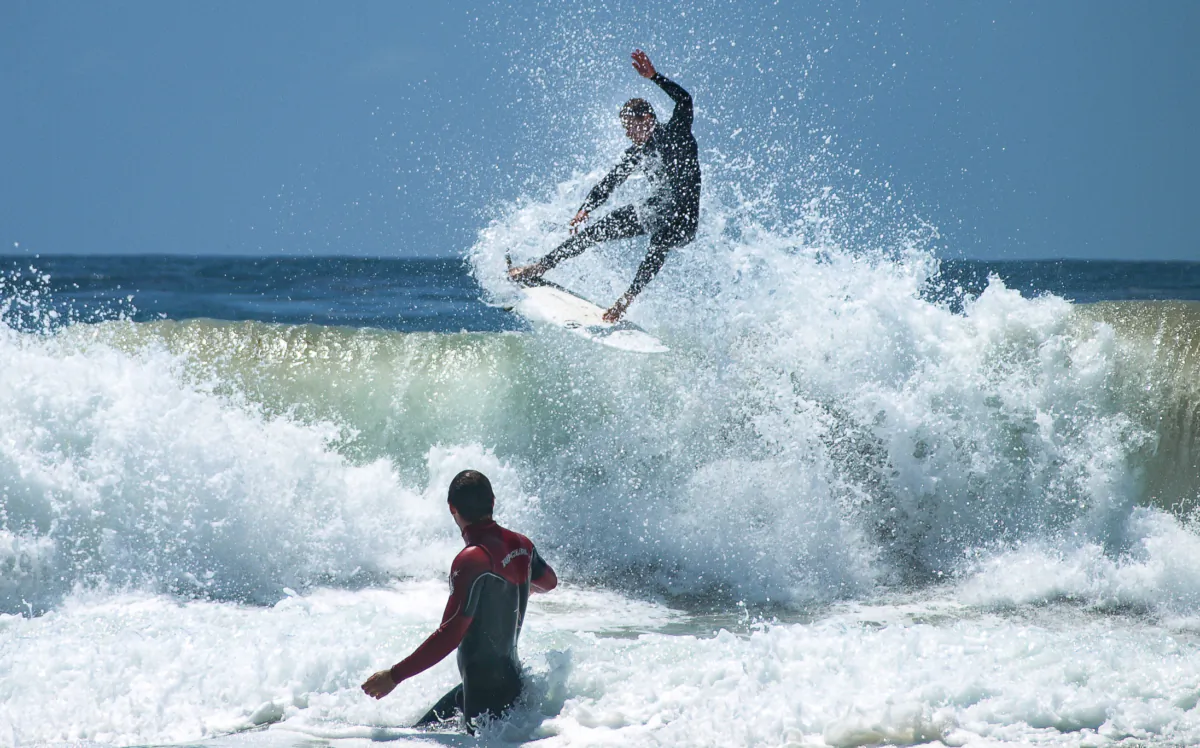 A man surfs in Newport Beach, Calif., in a file photo. (John Fredricks/The Epoch Times)